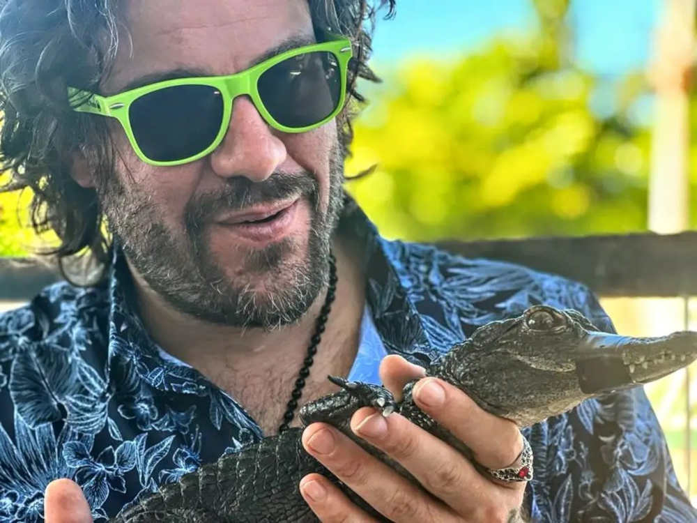Alfonso-Ferrazza-with-reptilian-friend